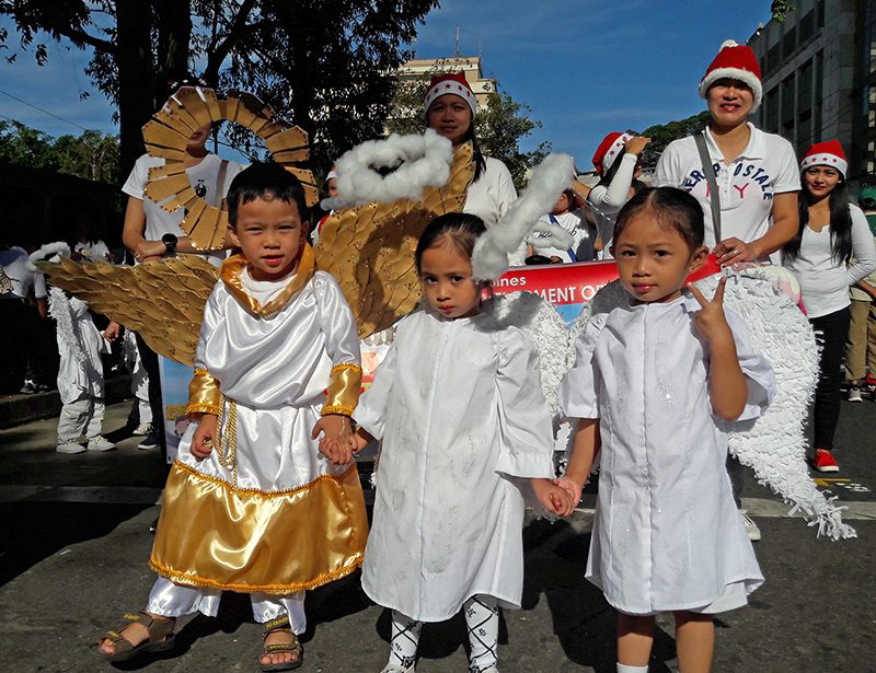 GOLDEN WINGS. More little angels join the parade. Photo by Mau Victa/Rappler  