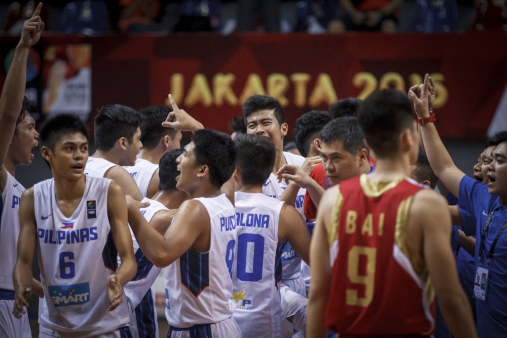 HISTORY. Batang Gilas celebrates the history they made by defeating China, who was previously unbeaten in the tournament since 2009. Photo from FIBA 