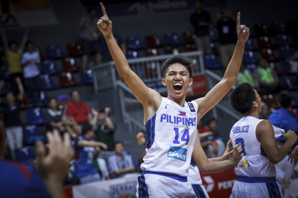 JOY. A very happy Jason Credo contributes 10 points, including key baskets down the stretch, in the victory. Photo from FIBA  