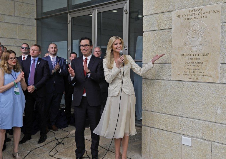 INAUGURATION. US Treasury Secretary Steve Mnuchin (center, left)) claps as US presidential daughter Ivanka Trump unveils an inauguration plaque during the opening of the US embassy in Jerusalem on May 14, 2018. Photo by Menahem Kahana/AFP    