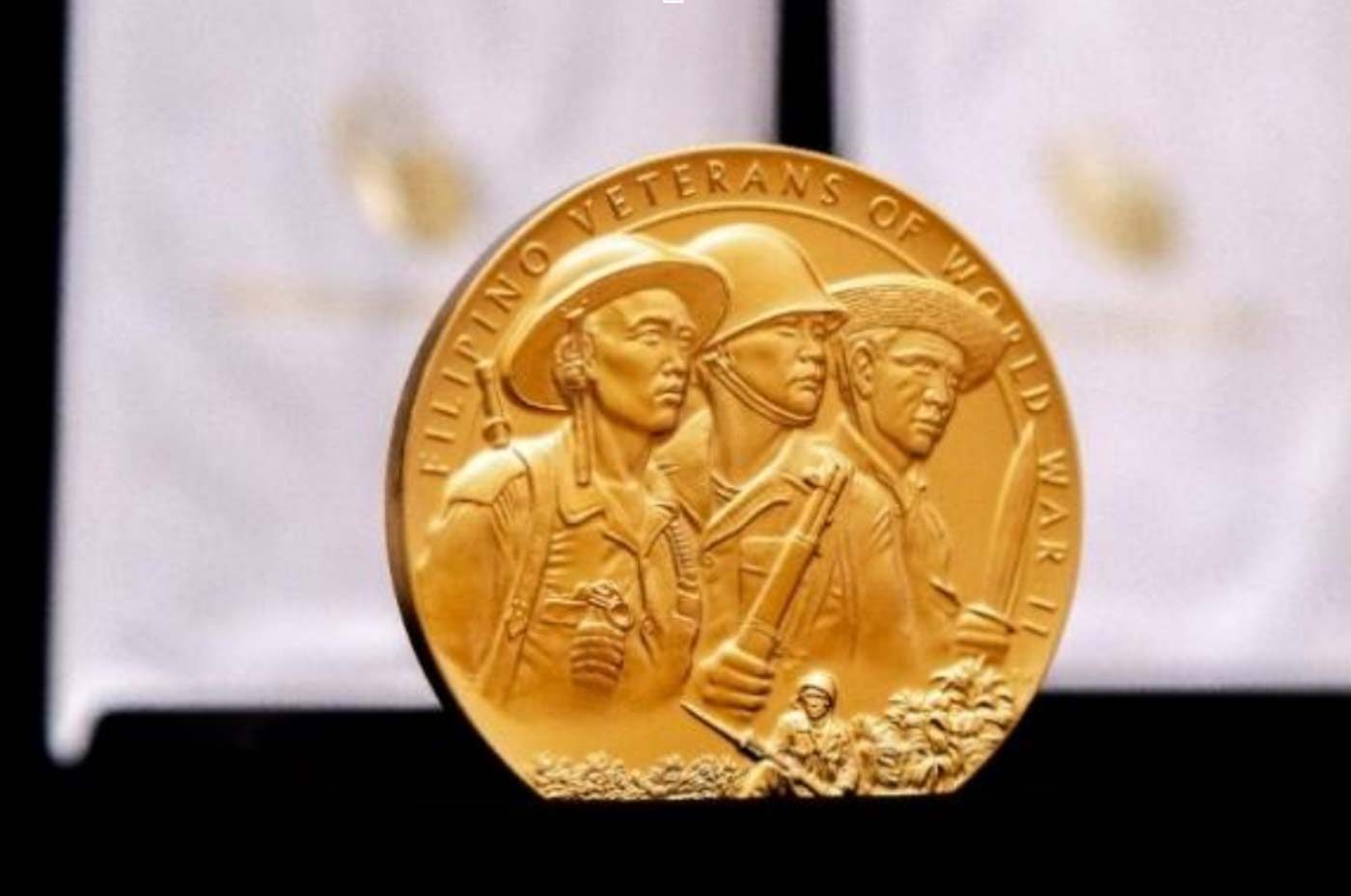 REPLICA. A bronze replica of the Filipino World War II Veterans Congressional Gold Medal is displayed during a ceremony at the U.S. embassy in the Philippines on September 13, 2018. Photo courtesy of United States embassy in Manila 