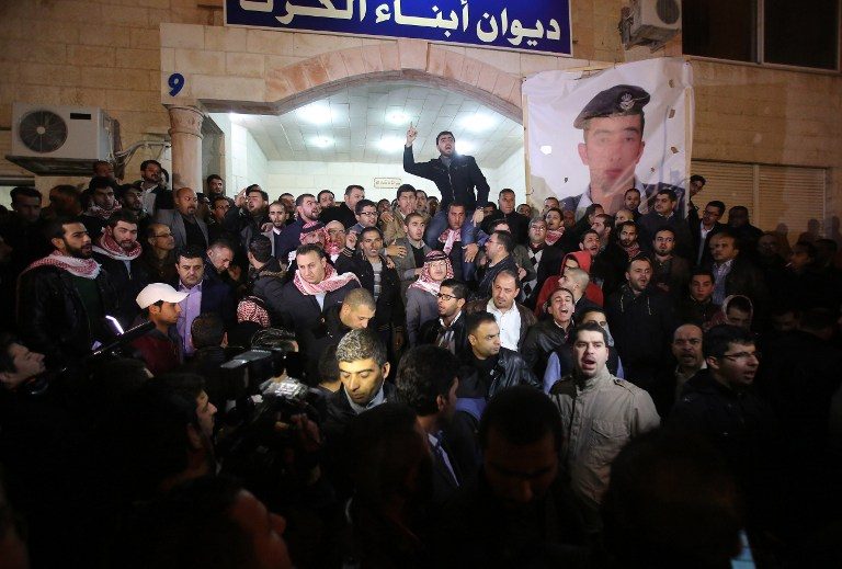 ANGER. Supporters and family members of Jordanian pilot First Lieutenant Maaz al-Kassasbeh, 26-year-old, gather following his reported killing, at the Karak tribal gathering chamber or Diwan, in the Jordanian capital Amman on February 3, 2015.  
