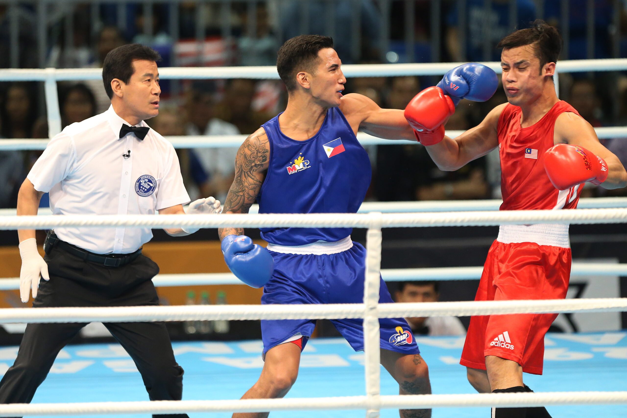 John Marvin destroys Malaysian foe in 21 seconds to win light heavyweight gold