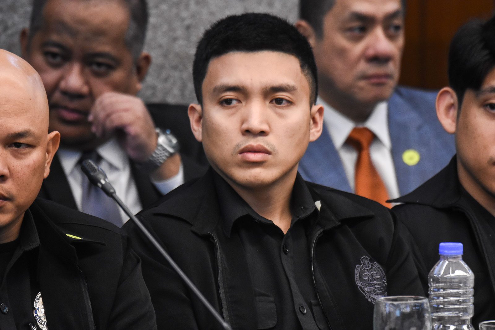 'NOT ME'. Immigration Officer Ralph Ryan Garcia at the continuation of the hearing on the payout system called 'Pastillas' scheme involving Bureau of Immigration officers at the NAIA terminals on March 2, 2020. Photo by Angie de Silva/Rappler 