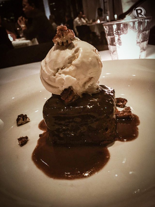Sticky date pudding, topped with vanilla ice cream and caramel sauce from Blackbird. Photo by Paolo Abad   