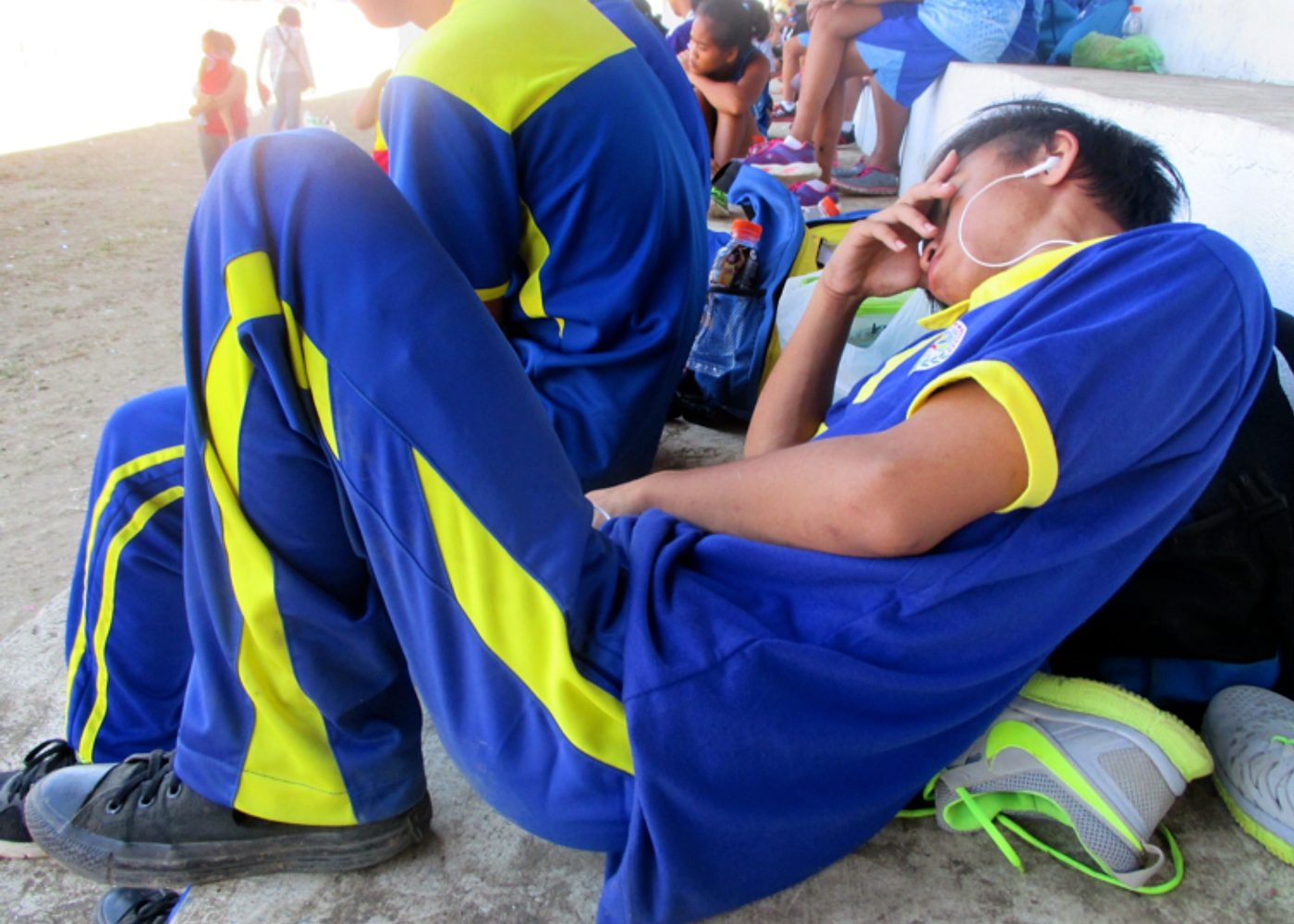 POWER NAP. Student-athletes catch some sleep in the grandstand of the Binirayan Sports Complex in San Jose, Antique.  