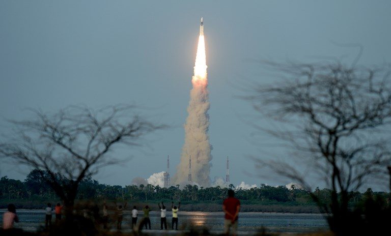 India shows off space prowess with launch of mega-rocket