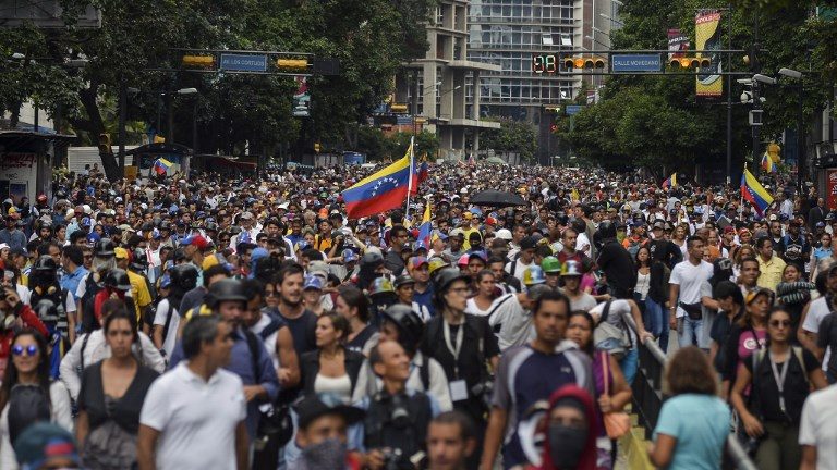 Teen killed in Venezuela as general urges troops not to hurt protesters