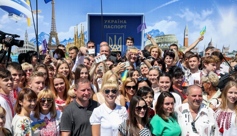 Ukrainians cheer on first day of visa-free EU travel