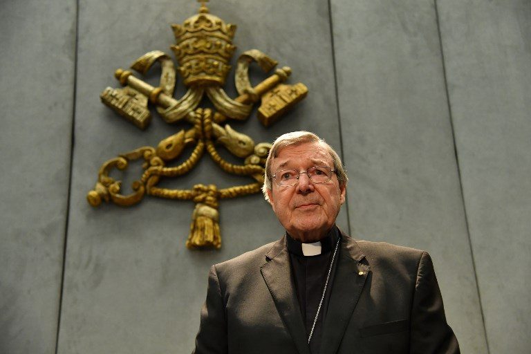 Cardinal Pell back in Australia to face abuse charges