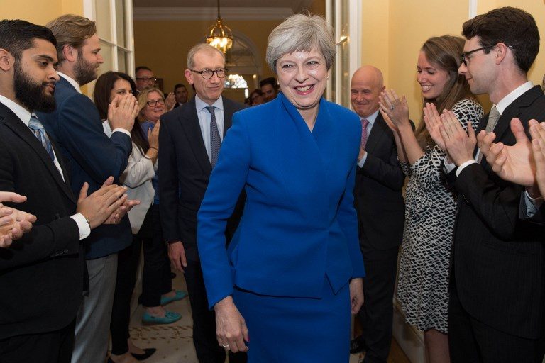 British PM regroups after election setback
