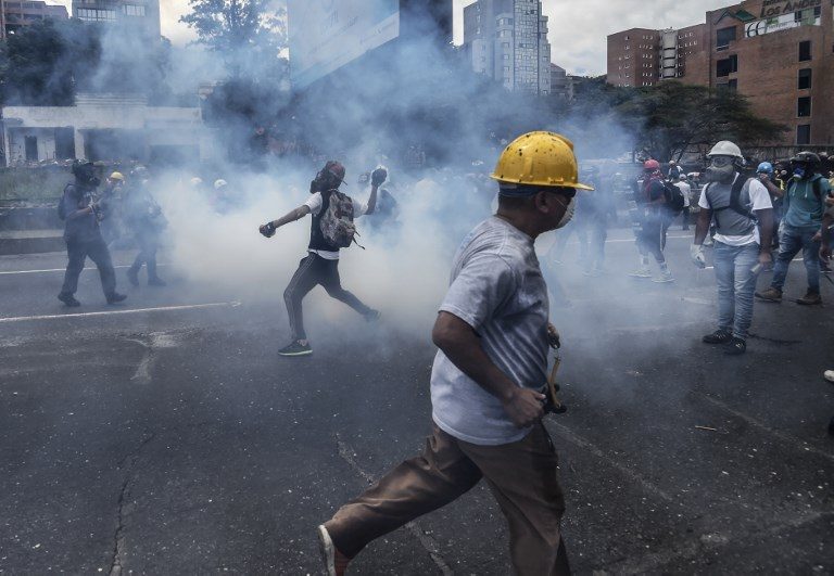 As Venezuela burns, a divided region proves short on solutions