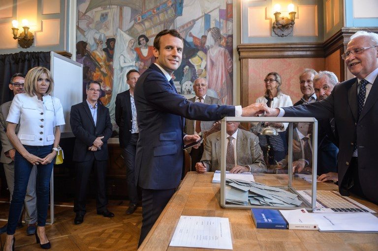 France’s Macron heads for crushing parliamentary majority