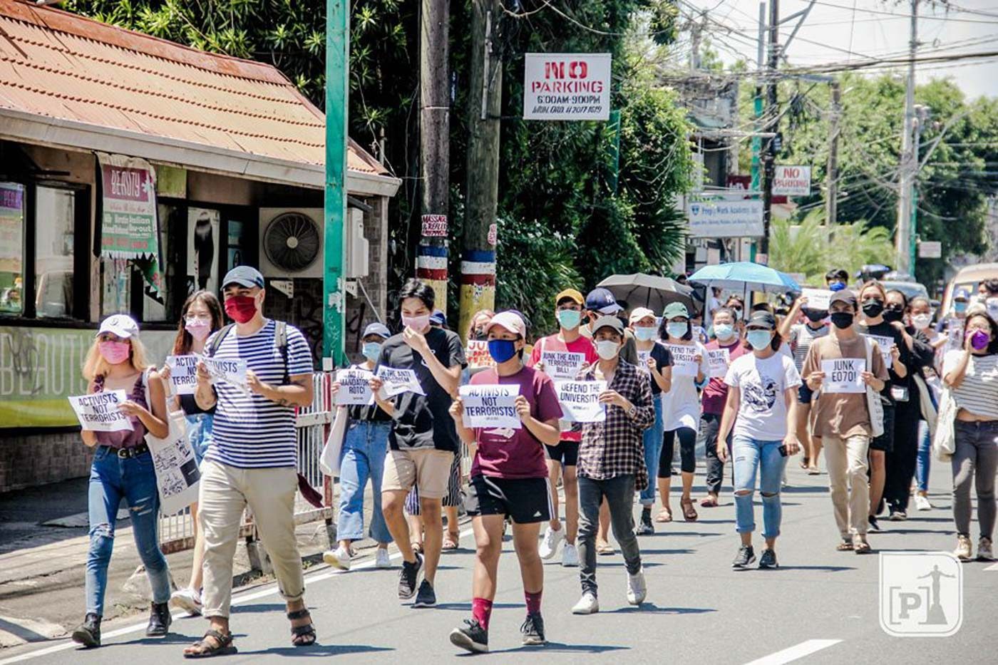 CALL TO JUNK. Students from UP Los Baños stage an indignation rally along Lopez Ave., Los Baños, to register their calls in junking the Anti-Terrorism Bill on Thursday, June 4. They also called out the government on their inaction towards the pandemic. Photo by Dianne Sanchez/ UPLB Perspective 