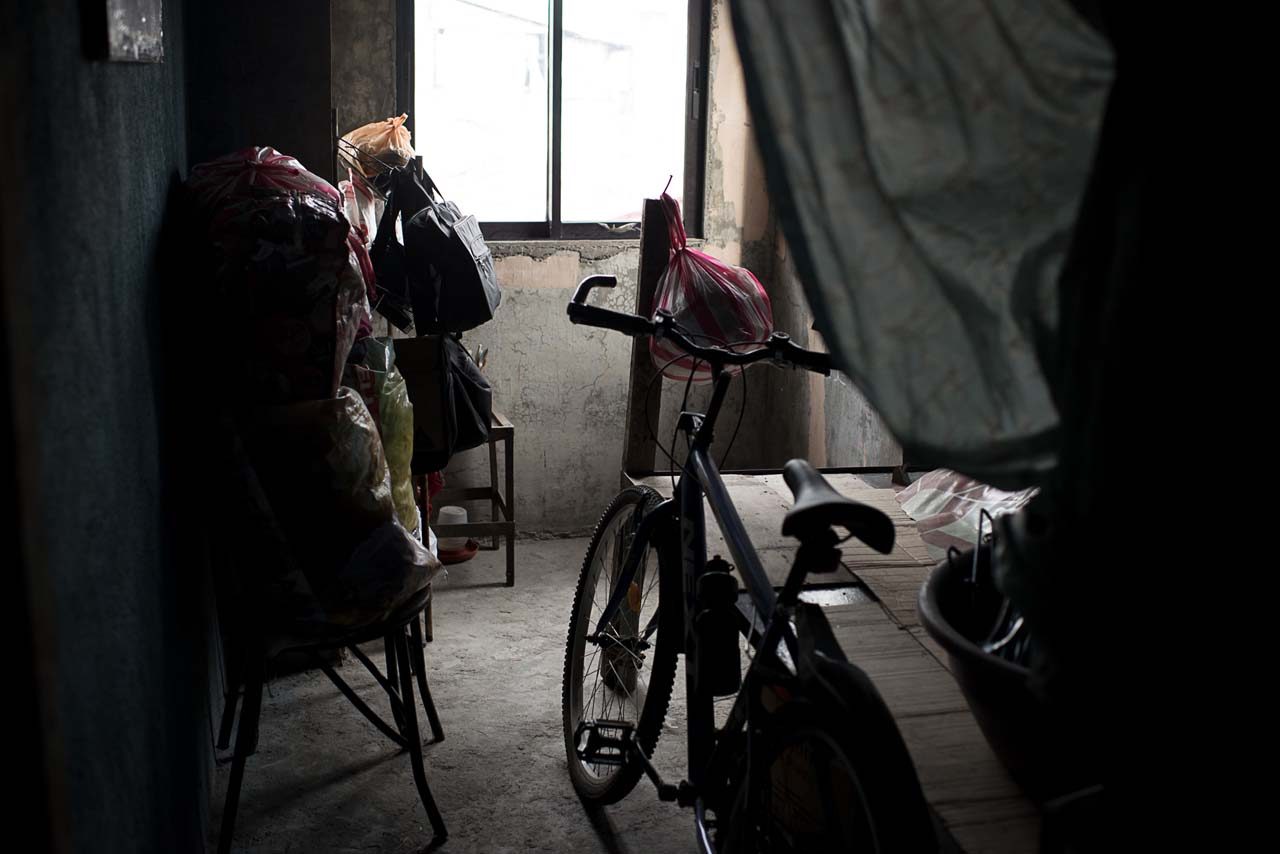 ABANDONED BIKE. Kian's bike rests in an abandoned room in their home in Caloocan