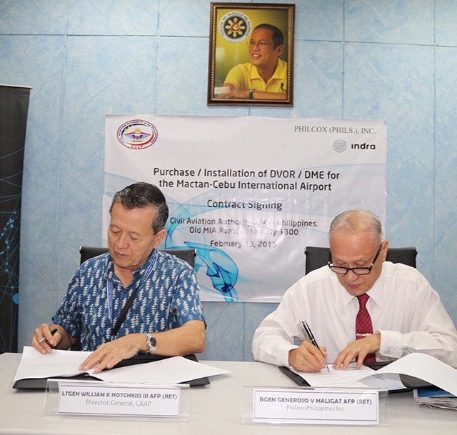 DEAL SIGNED. CAAP's Director-General William K. Hotchkiss lll and Philcox (Phils) Inc./Indra Australia Pty. Ltd.'s (RET.) B/GEN Generoso Maligat sign the deal for the P49M installation of a new navigational system at Mactan-Cebu International Airport. Photo from CAAP  