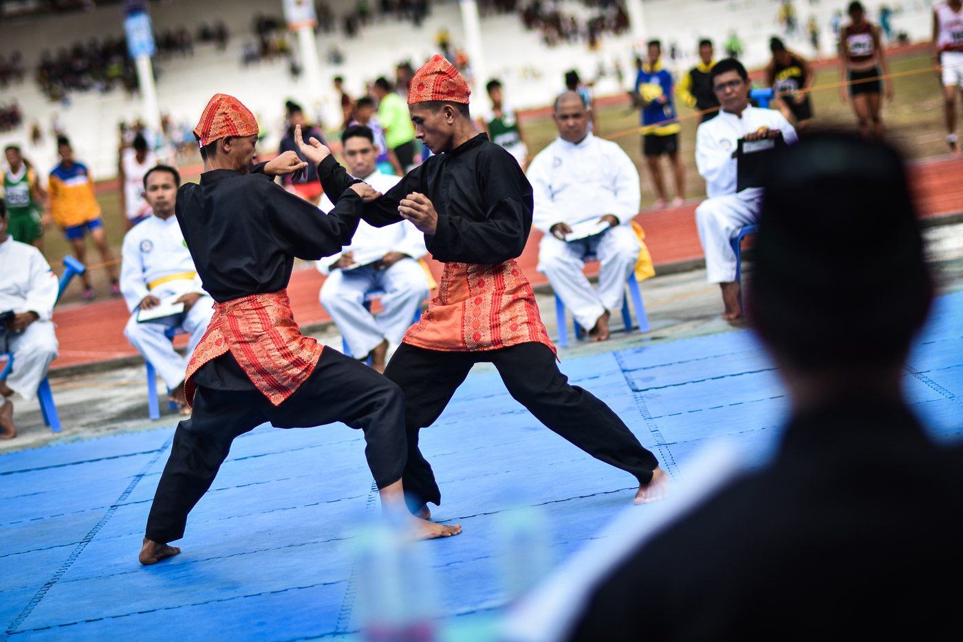 DEBUT. Pencak Silat, a demo sport at the Palarong Pambansa 2017, starts at the EBJ Sports Complex in San Jose, Antique. Photo by LeAnne Jazul/Rappler  