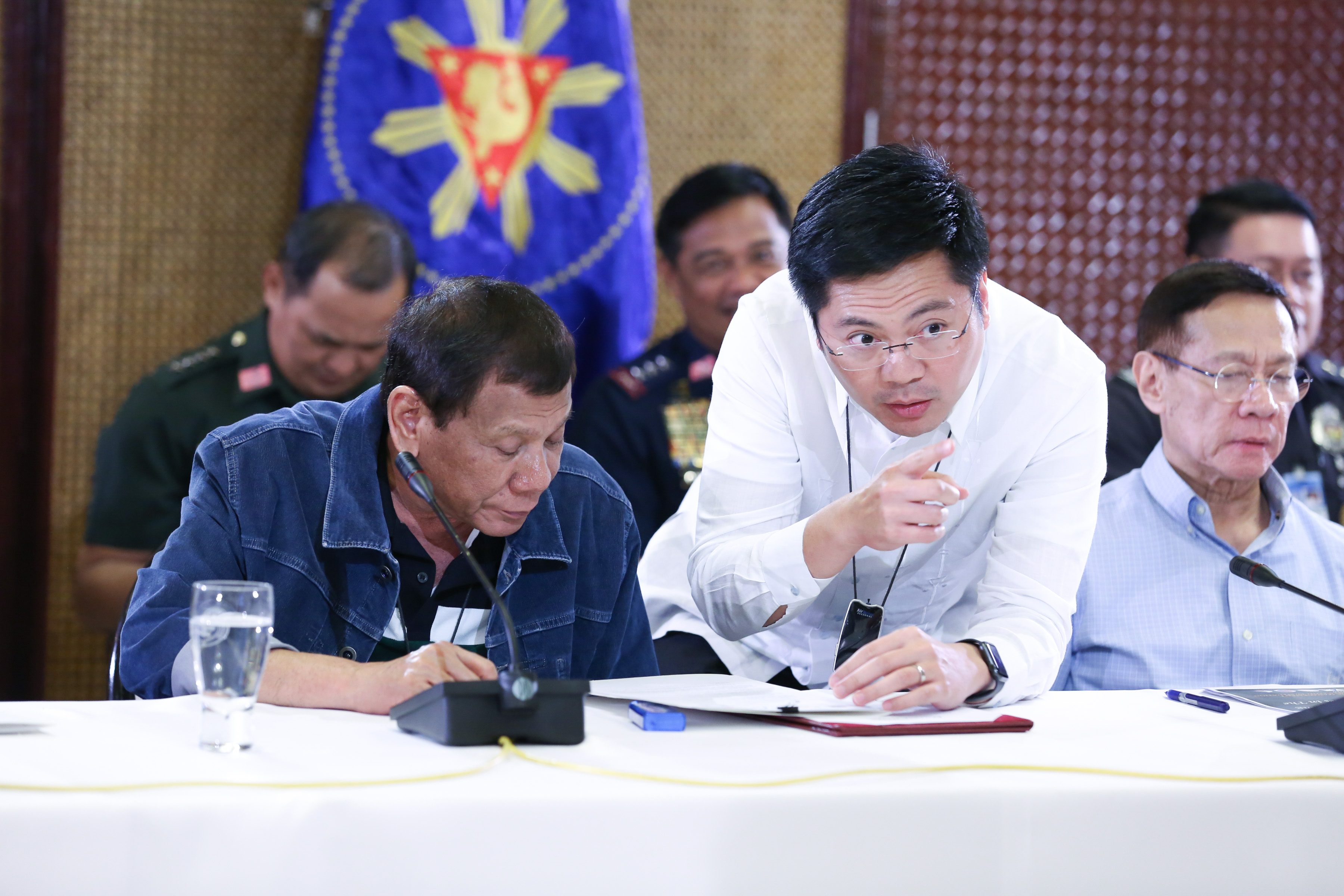 CORONAVIRUS TASK FORCE. President Rodrigo Duterte confers with Cabinet Secretary Karlo Nograles during a meeting with the Inter-Agency Task Force on the Emerging Infectious Diseases on March 12, 2020. Malacañang file photo 