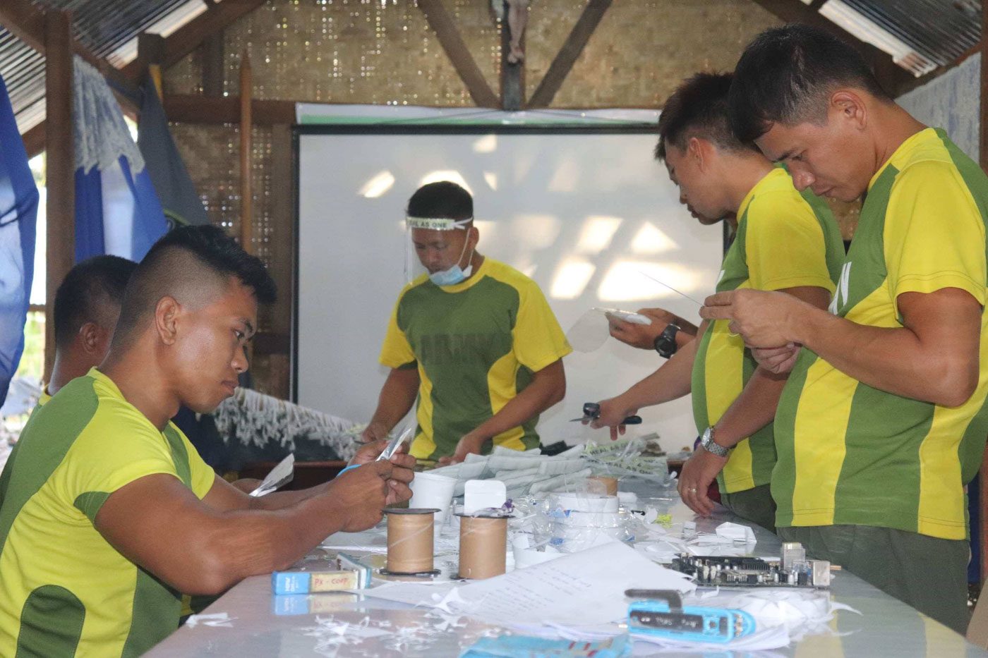 FACE SHIELDS. Philippine Army soldiers based in Basey, Samar, produce face shields. Photo courtesy of 63rd Infantry Battalion, Philippine Army   