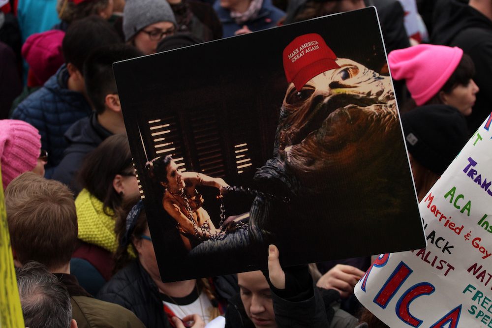 Princess Leia chained to Jabba the Hutt... wearing a MAGA cap. 