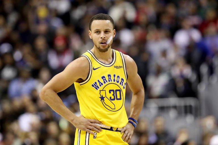 Curry heats up as Warriors fend off Pistons
