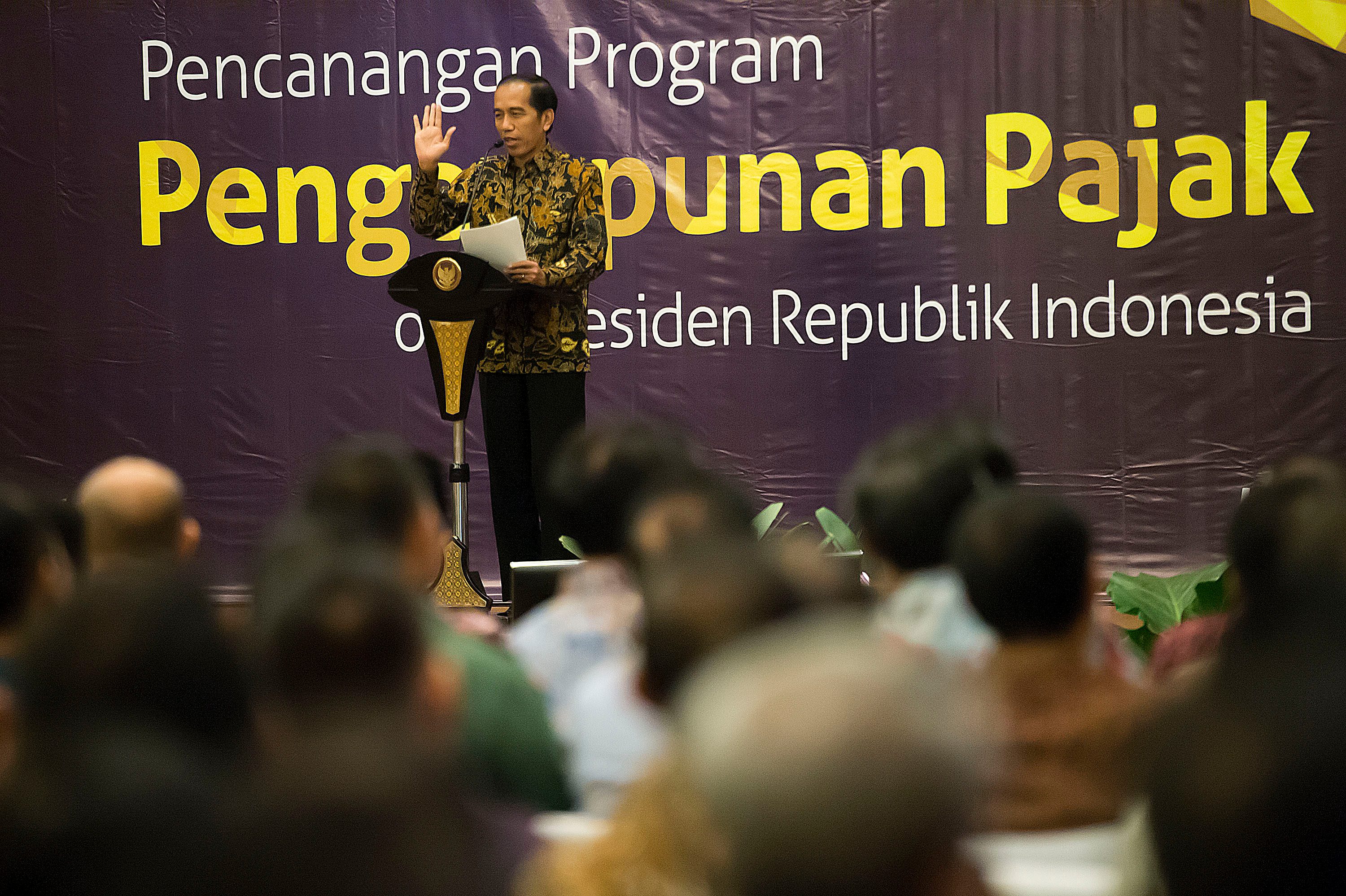 Presiden Jokowi menyampaikan sambutannya dalam acara Pencanangan Program Pengampunan Pajak (Tax Amnesty) di Kantor Pusat Ditjen Pajak, Jakarta, pada 1 Juli 2016. Foto oleh Widodo S. Jusuf/Antara 