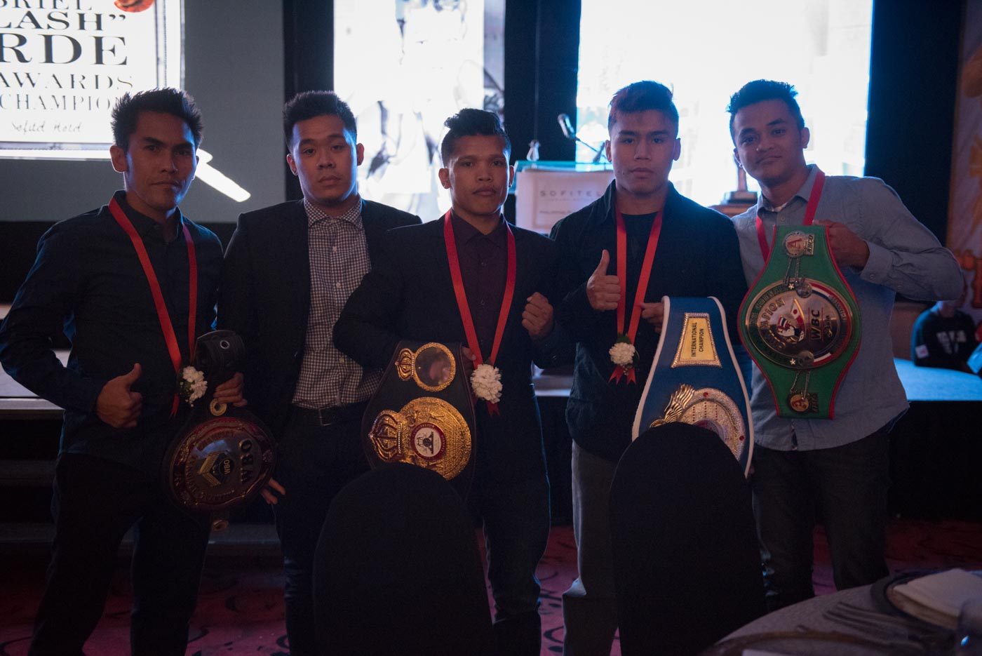 General Santos City-based promoter Jim Claude Manangquil (second from left) with boxers Jether Oliva, Randy Petalcorin, Rimar Metuda and John Vincent Moralde. Photo by Arvee Eco/Rappler 