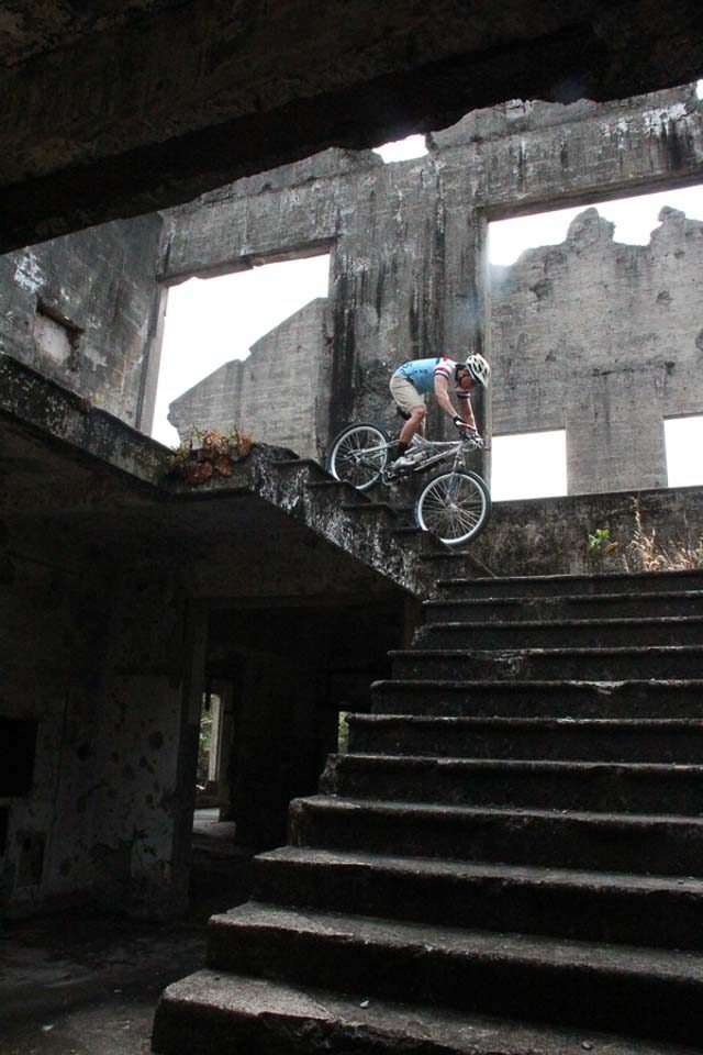 Photographer John Hendrix descending the staircase at the ruins of the Corregidor Hospital. Photo by Rome Jorge  