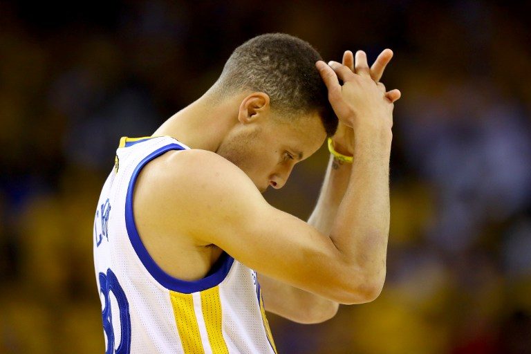 STING OF DEFEAT. Back-to-back NBA MVP Stephen Curry absorbs a tough finals defeat after a 73-win season for the Warriors. Ezra Shaw/Getty Images/AFP 