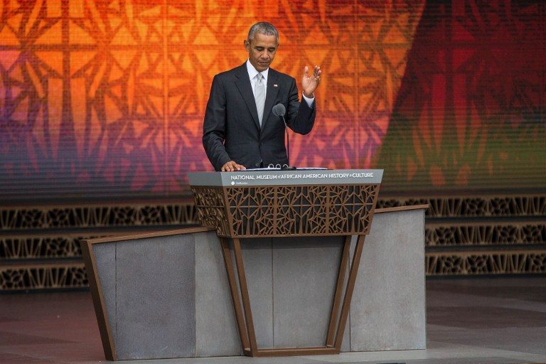 Obama opens new African American Museum amid racial strife