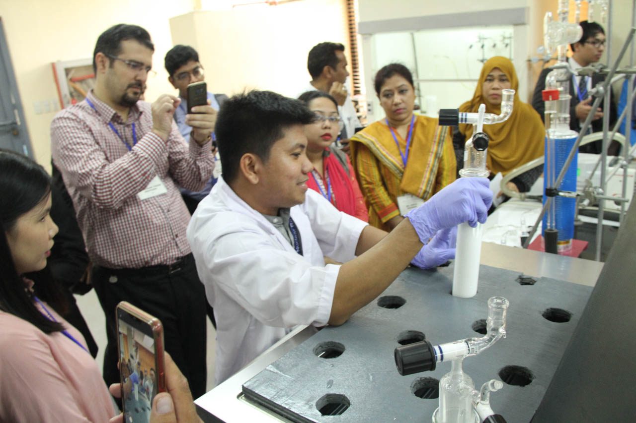 DEMO. During a training course hosted by the Philippines under the International Atomic Energy Agency, representatives from the Asia-Pacific observe as a researcher demonstrates
radiation grafting procedures at the PNRI Chemistry Research Section. Photo from DOST  