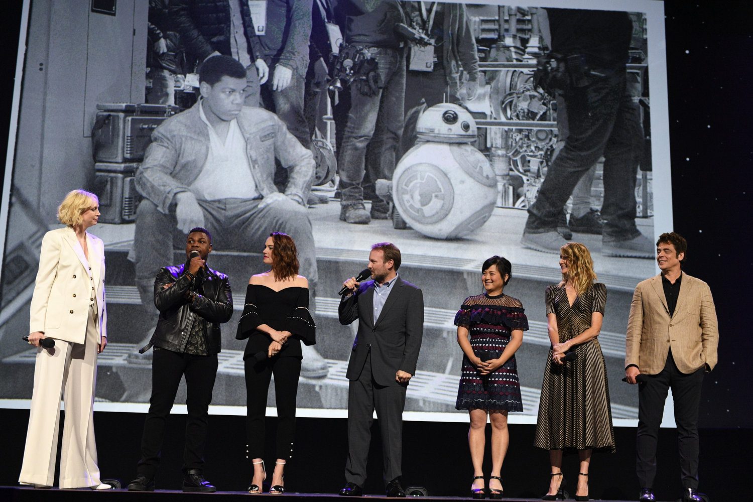 'THE LAST JEDI.' The cast of 'Star Wars: The Last Jedi' takes the stage at D23 Expo 2017. From left to right: Gwendoline Christie, John Boyega, Daisy Ridley, director Rian Johnson, Kelly Marie Tran, Laura Dern, and Benicio del Toro. Photo by Disney/Image Group LA 