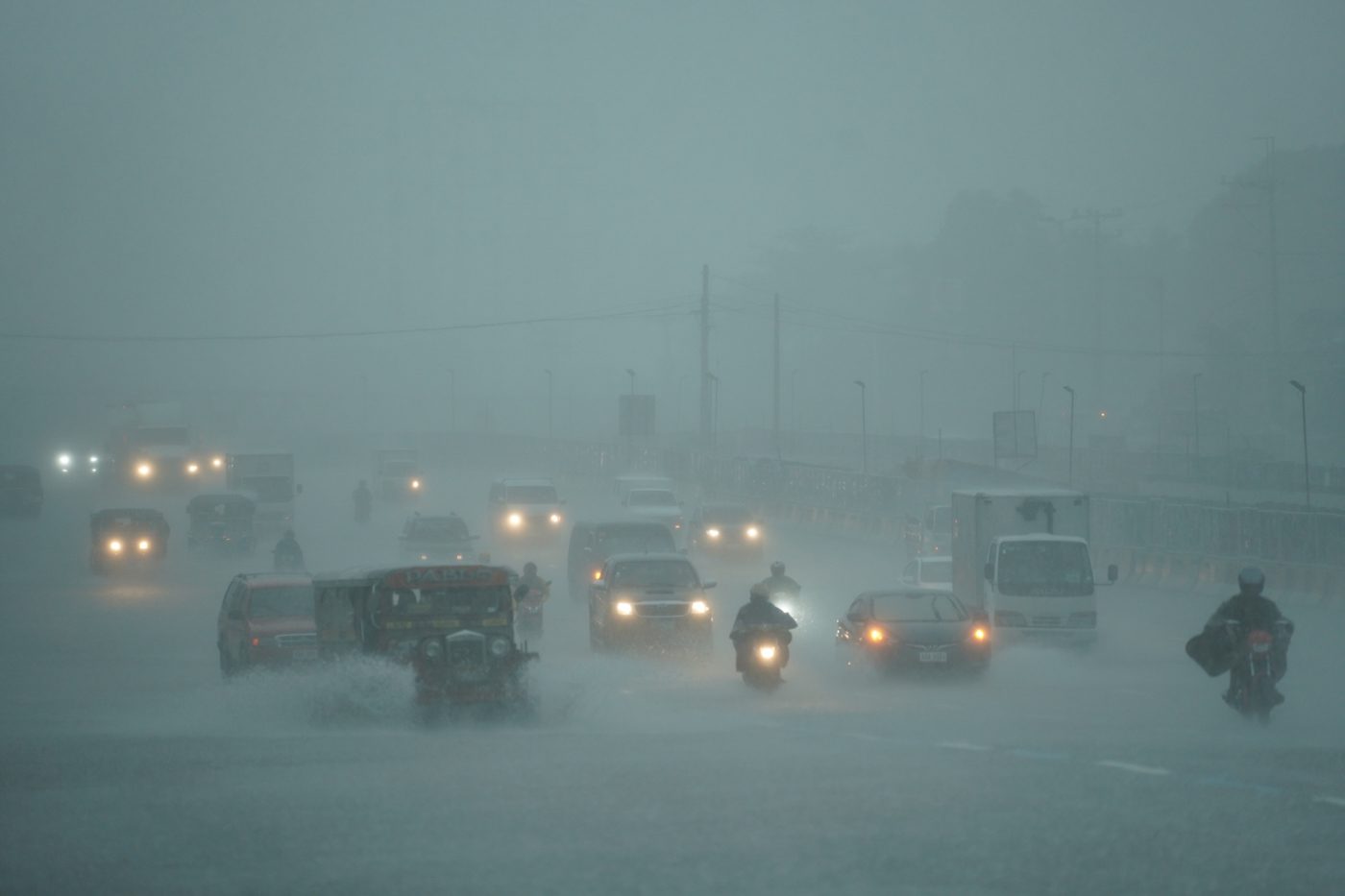 LOOK: Heavy rain floods Metro Manila, Rizal