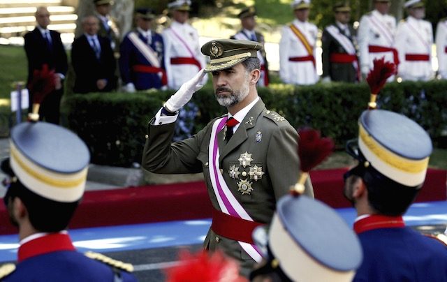 King Felipe boosts scandal-hit crown in changing Spain