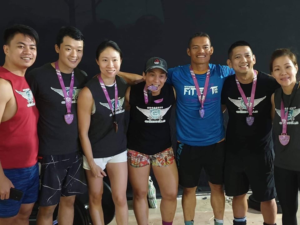 WINNER. CrossFit athletes Jen Yalung (fourth from left) celebrates a medal finish. Contributed photo 