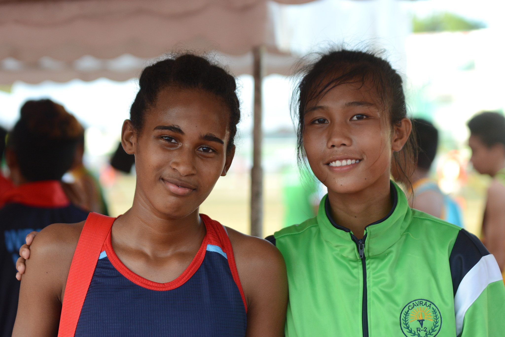 RIVALRY. Western Visayas' Alexie Mae Caimoso (left) and Cagayan Valley's Cherry Mae Banatao have been battling for the high jump gold since 2016. File photo by Roy Secretario/ Rappler 