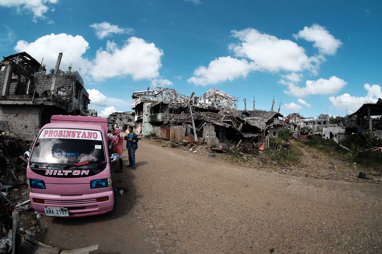 NOTHING TO RETURN TO. Many residents of Sector 2 of the MAA return to totally destroyed homes. Photo by Bobby Lagsa/Rappler   