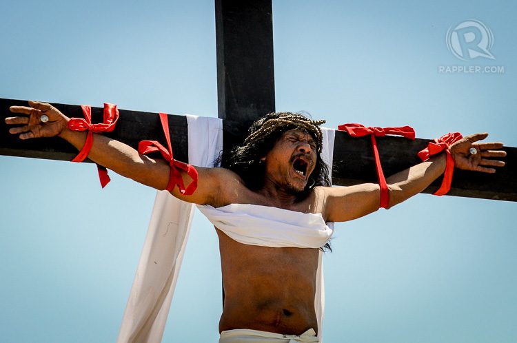 CHRIST. Enaje screams after being nailed to the cross during the Senakulo or Via Crusis.  