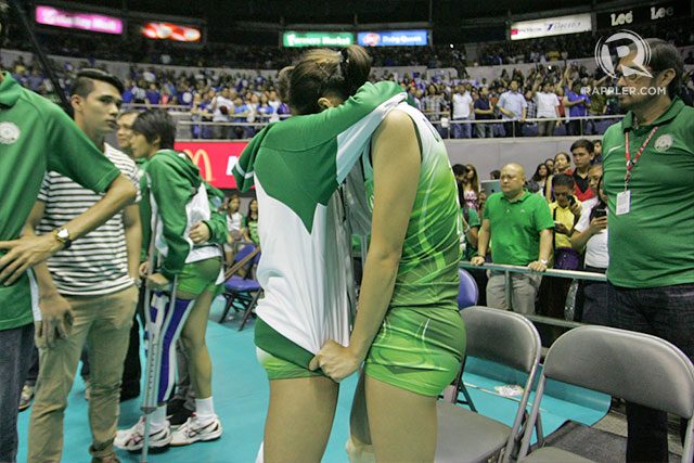 DLSU's (7) Camille Cruz and (16) Cienne Cruz hug it out after the tough loss and Camille's injury. Photo Josh Albelda/Rappler 