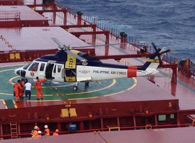 RESCUE AT SEA. A Philippine Air Force chopper waits for Able Seaman Jaime Jerome. Photo courtesy of Air Force  