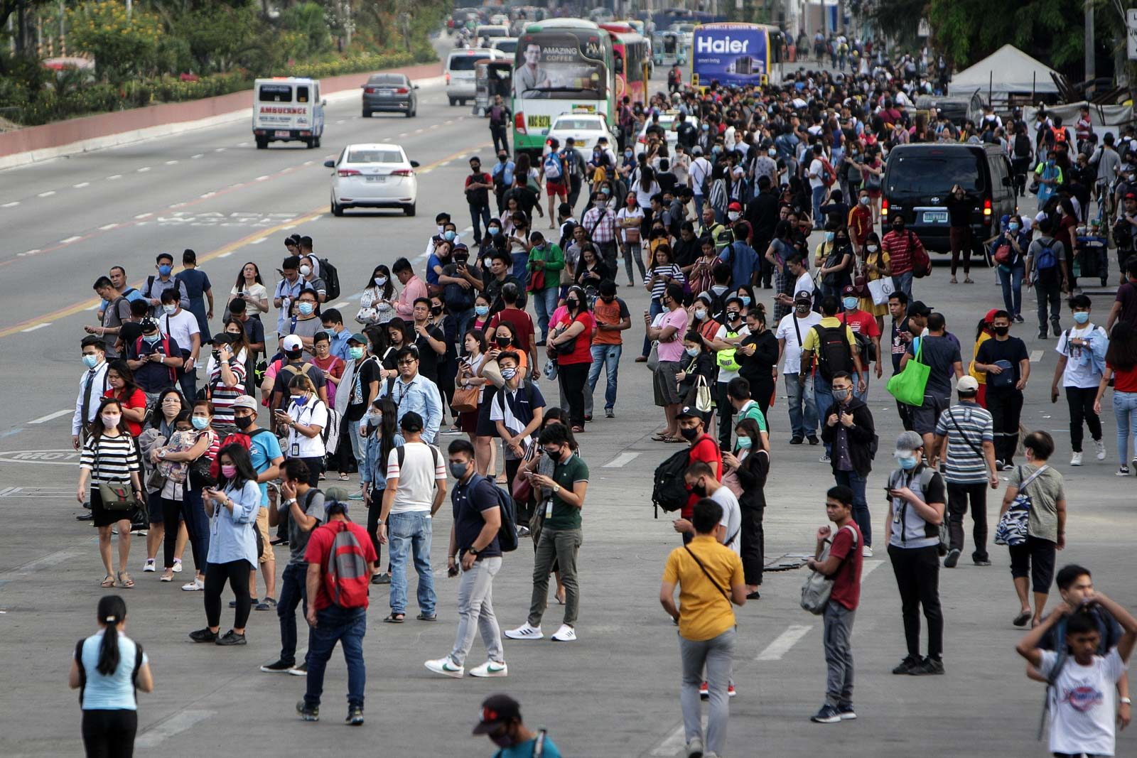 RUSH HOUR. Commuters take up a few lanes along the road in Pasay and Parañaque on March 16, 2020. Photo by Ben Nabong/Rappler 