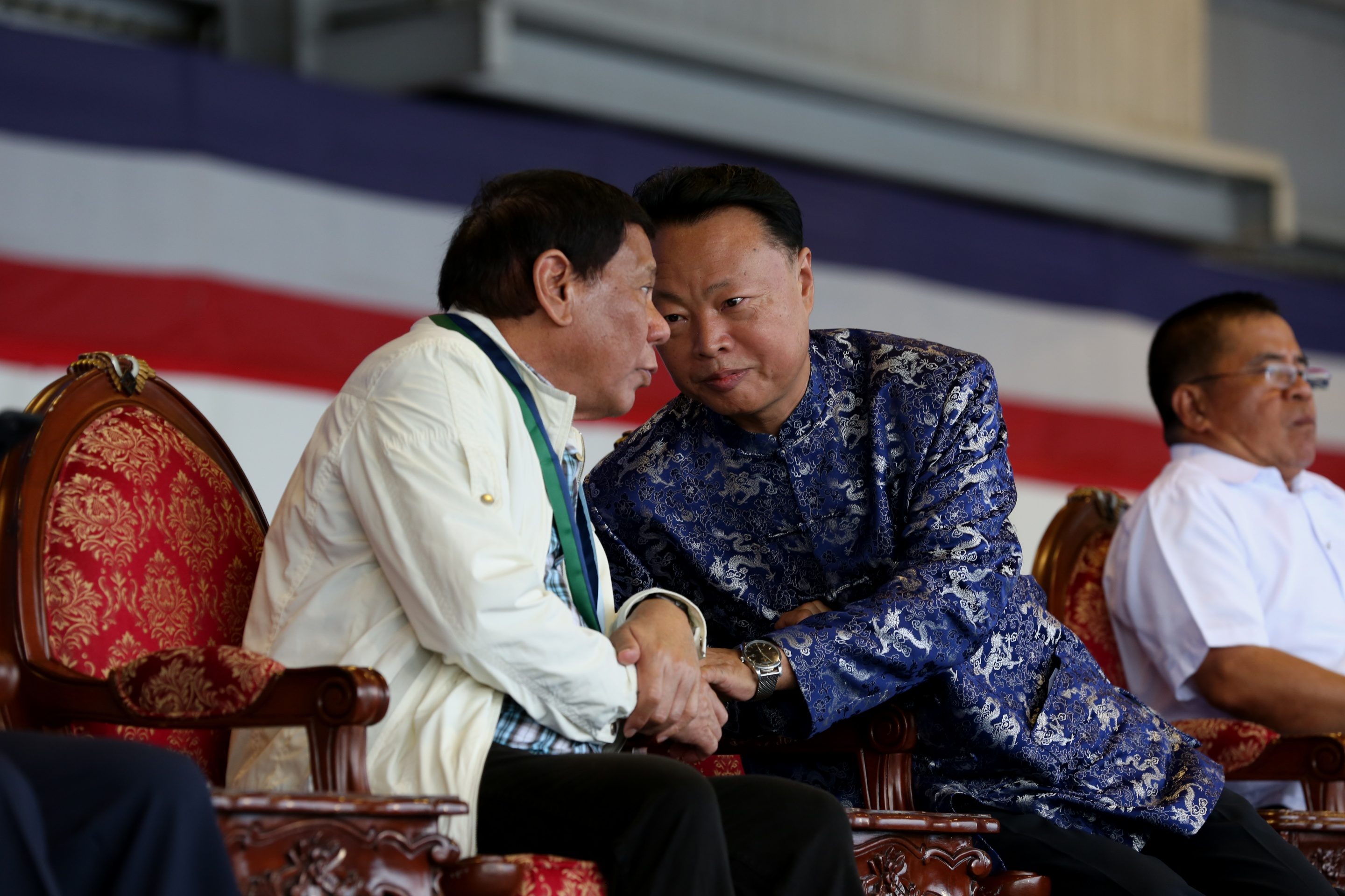 NEW 'FRIEND.' President Rodrigo Duterte discusses matters with Chinese Ambassador Zhao Jianhua during the turnover of rifles donated by China to the military. Presidential photo  