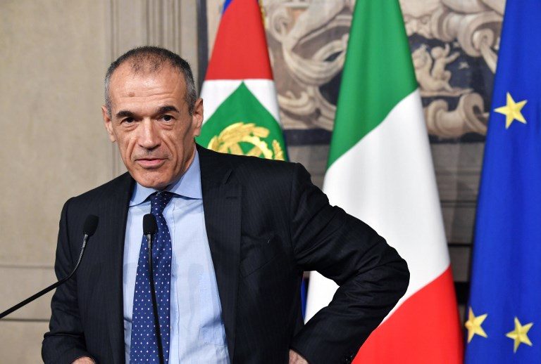 Showdown looms in Italy as caretaker PM assembles team