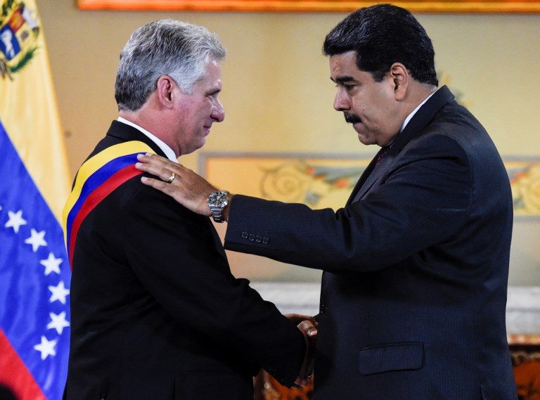 Cuban leader defends Maduro on 1st foreign visit