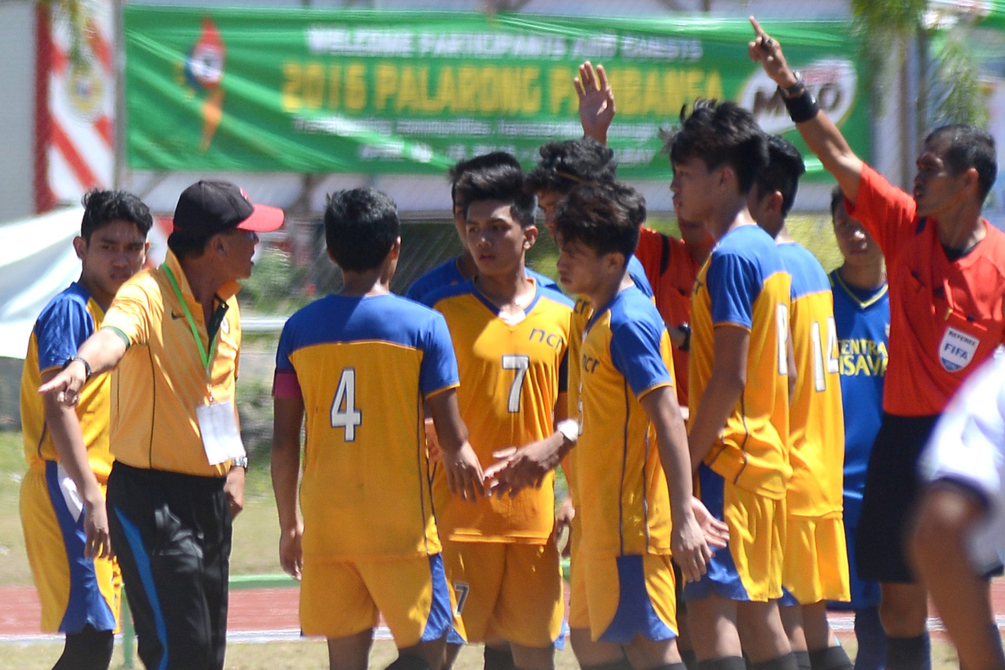 SCUFFLE. The NCR and Central Visayas football final is halted by several scuffles and commotions. Photo by Roy Secretario/Rappler 