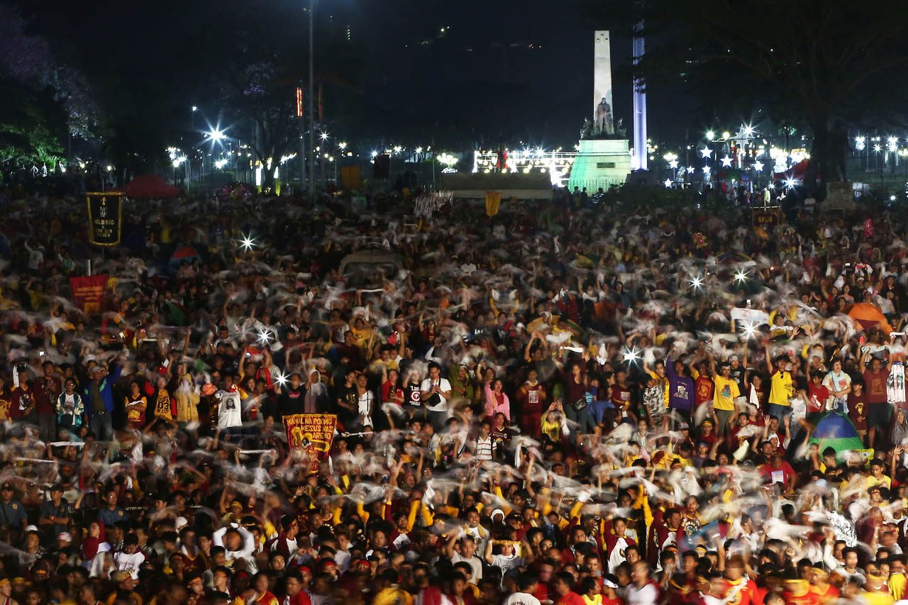 OVERFLOW. Thousands of devotees attend the midnight mass of the 2019 Black Nazarene Traslacion at the Quirino Grandstand. Photo by Ben Nabong  