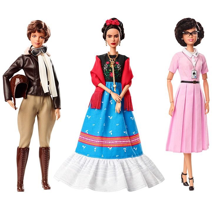 FIERCE WOMEN. From left: Amelia Earhart, Frida Khalo, and Katherine Johnson Barbie dolls. 