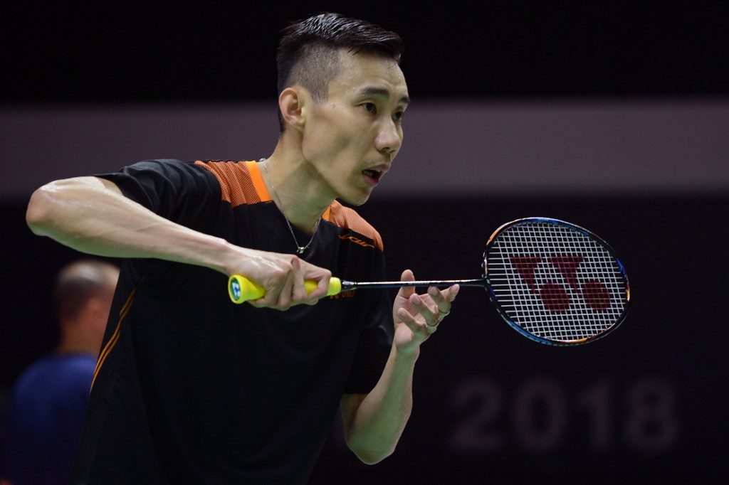 Tears as badminton star Lee quits after cancer battle