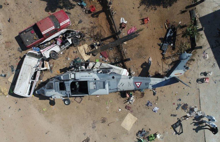 TRAGIC. A military helicopter crash-landed in Santiago Jamiltepec while on the way to the earthquake epicenter in Oaxaca, Mexico killing 13 people, 3 of them children, on February 17, 2018. Photo by Mario Vazquez/AFP 