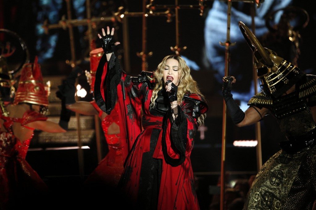 COVID-19. Madonna share that she has had the coronavirus and that it was why she had to cancel a concert in Paris in February, though she is not currently sick.  File photo by  Francois Guillot/AFP 